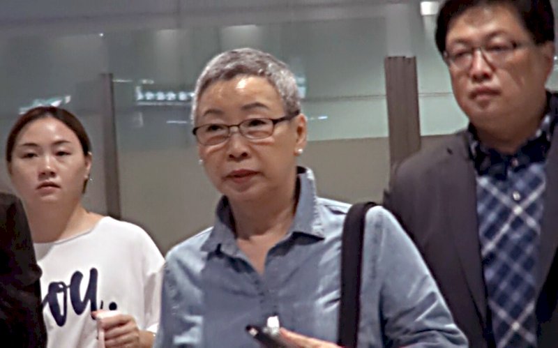 李明哲母親抵長沙台商接機 只回應謝謝